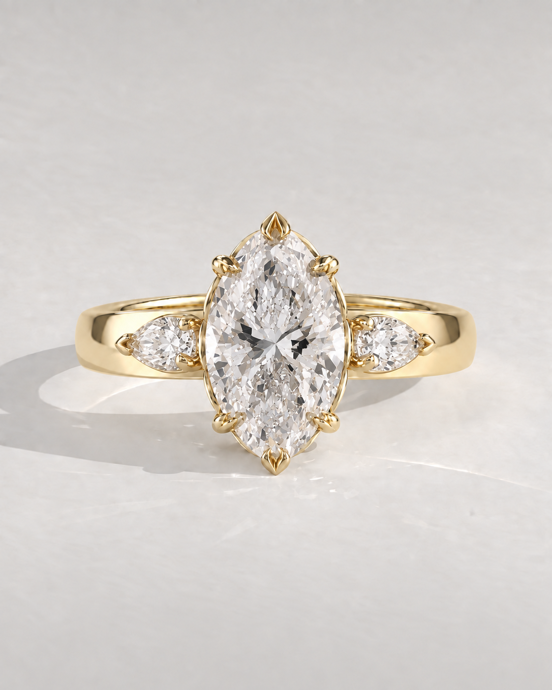 Amelie Marquise Three-Stone in 14k yellow gold — design visualization