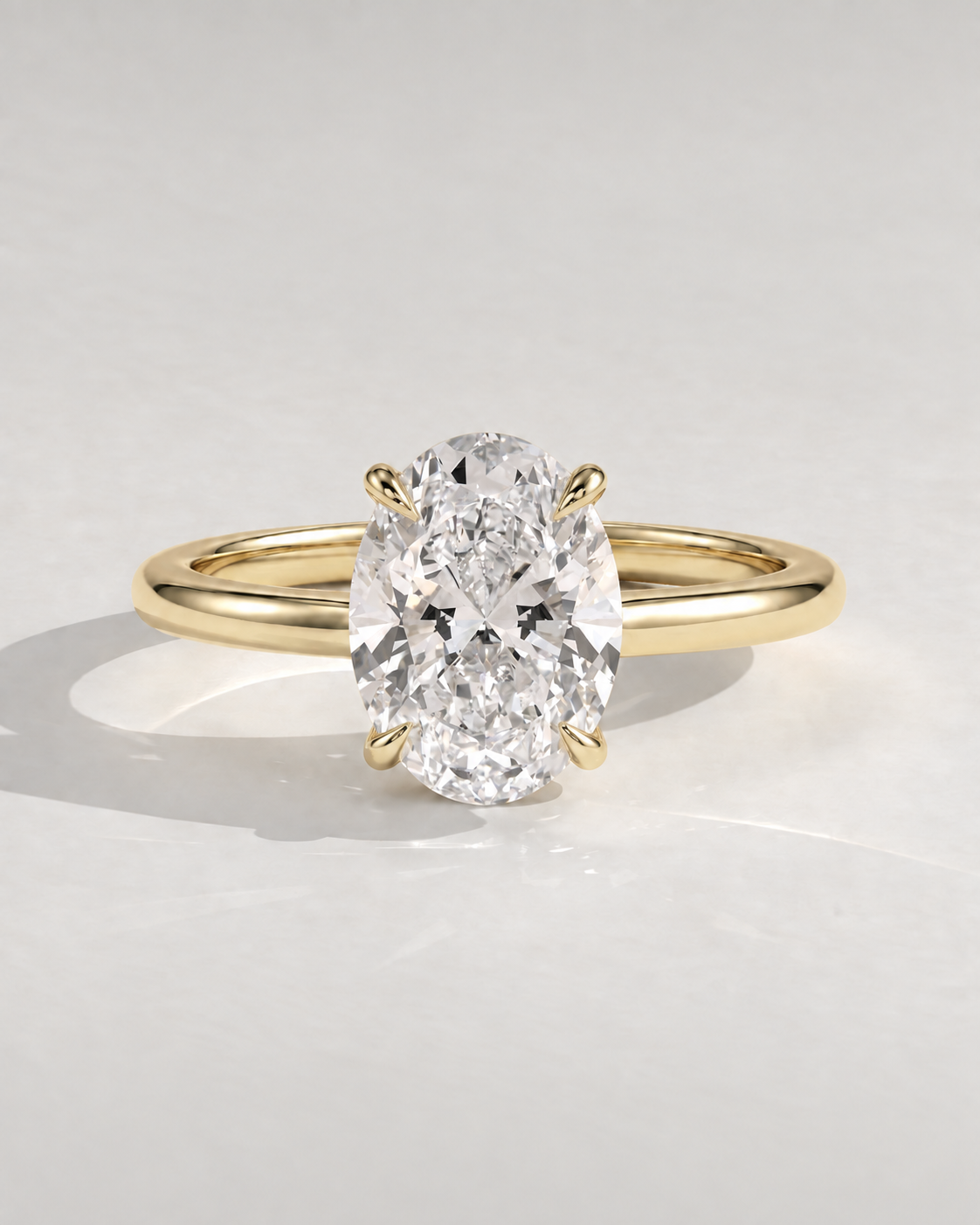 Aveline oval solitaire in 14k yellow gold — illustrative design render