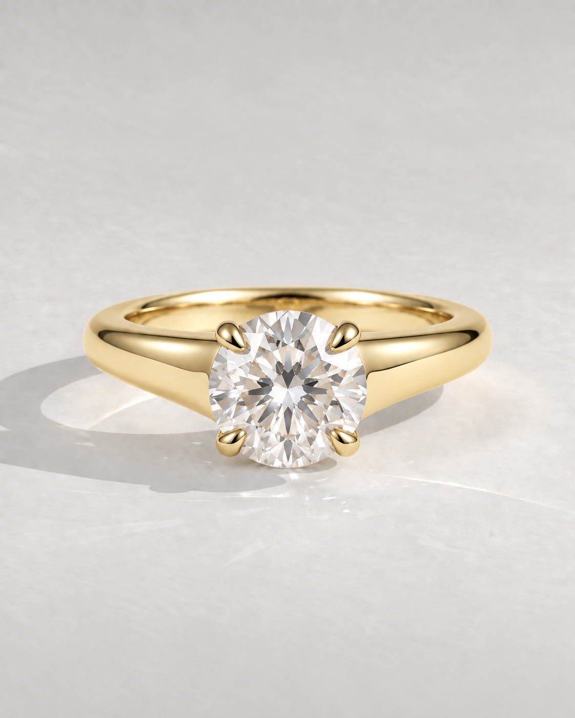 The Celine — Oval Tapered Solitaire Engagement Ring in 14k yellow gold — design visualization