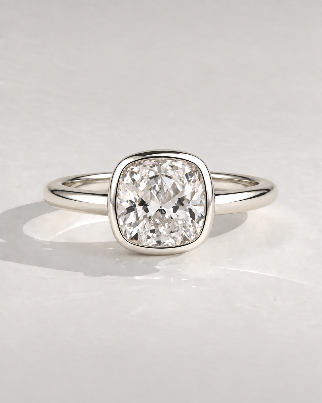 Cosette Cushion Bezel Solitaire in 14k white gold — design visualization