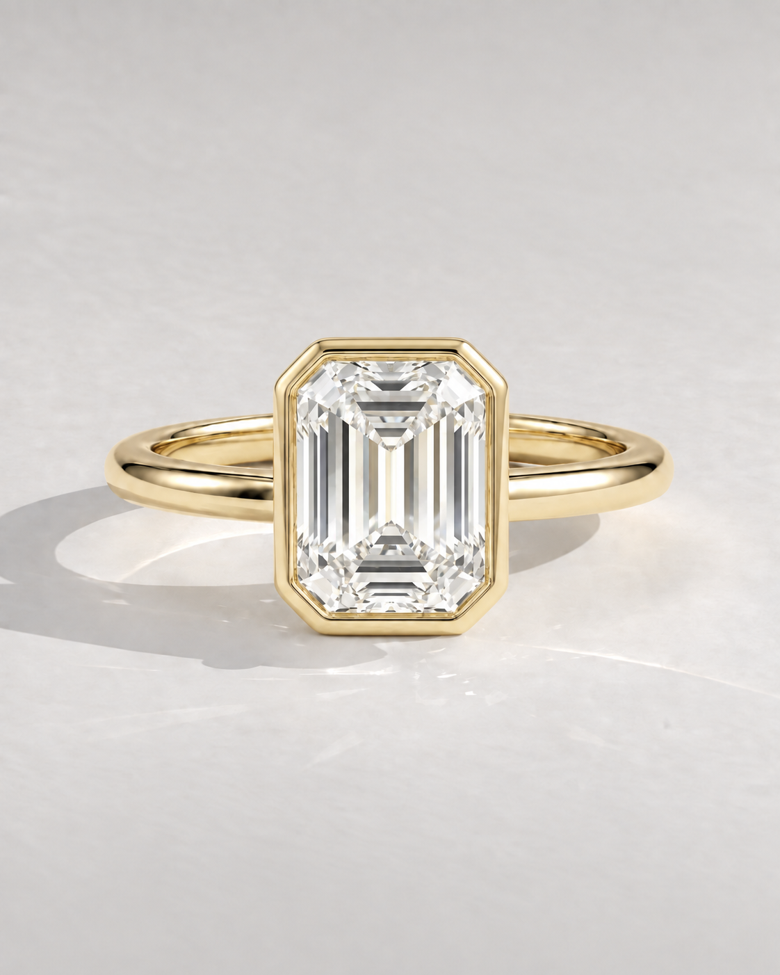 The Adeline — Emerald Bezel Solitaire Engagement Ring — illustrative design render