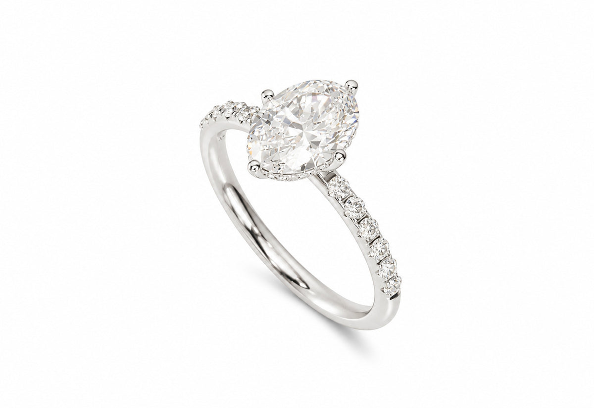 Oval hidden halo lab-grown diamond engagement ring, 14k White Gold, angled view, 3D render