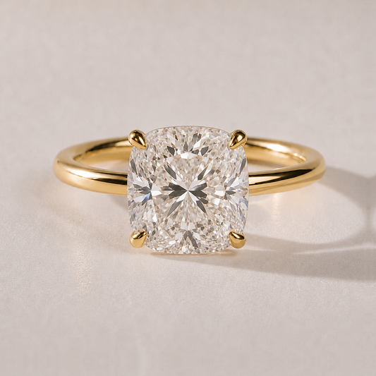 The Amalie — cushion-cut lab-grown diamond solitaire engagement ring in 14K yellow gold