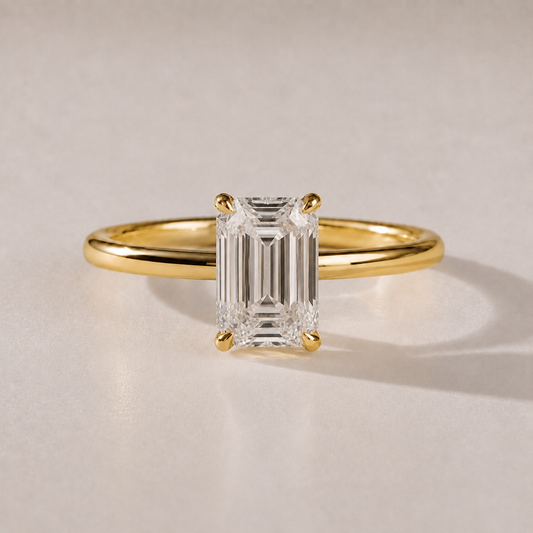The Clara emerald-cut lab-grown diamond solitaire engagement ring in 14K yellow gold