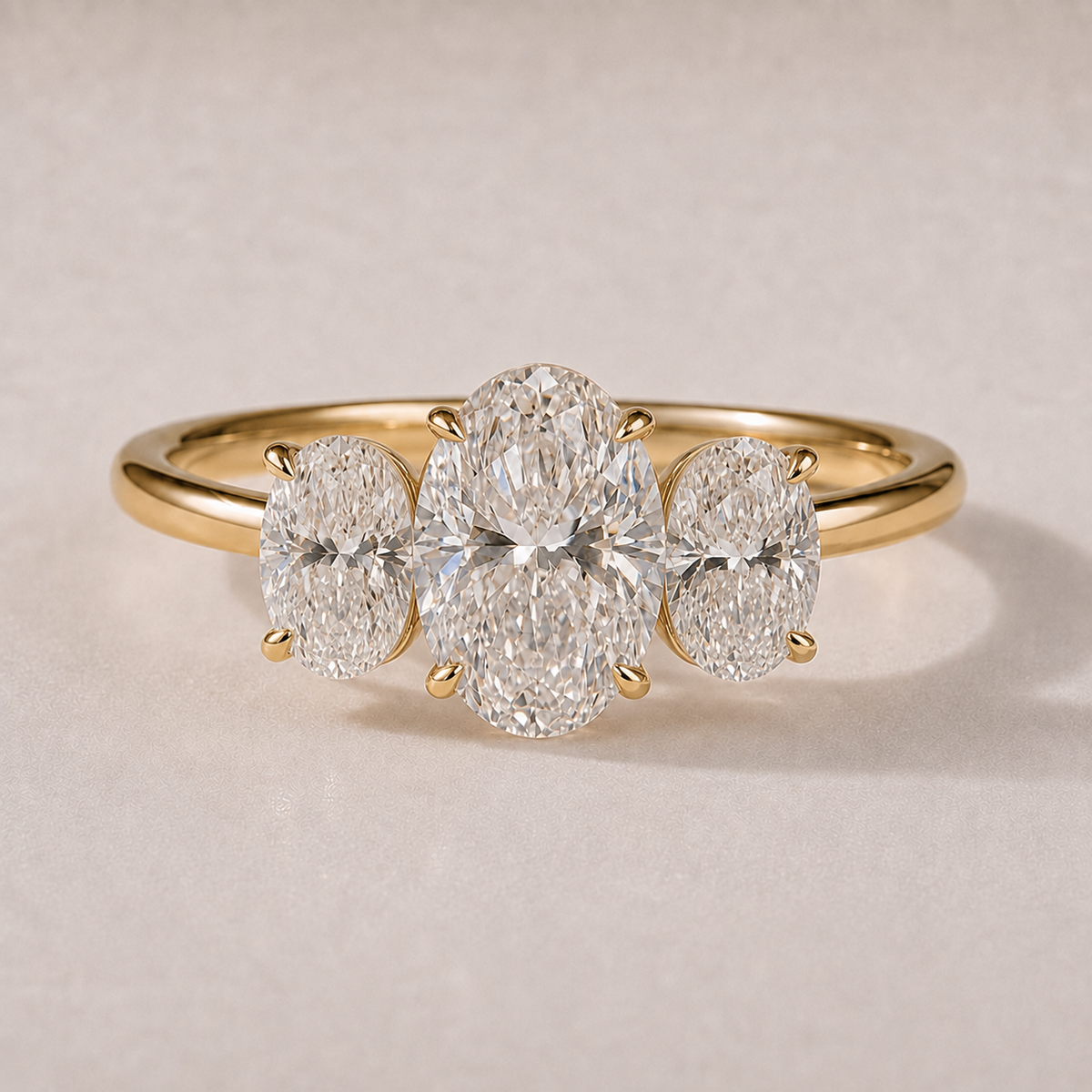 The Evangeline — three oval lab-grown diamond engagement ring in 14K yellow gold