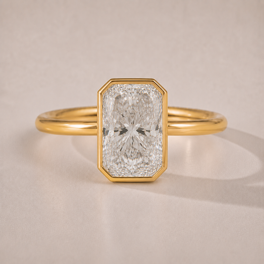 The Margaux — radiant-cut bezel-set lab-grown diamond engagement ring in 14K yellow gold