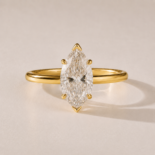 The Mirabelle marquise lab-grown diamond hidden halo engagement ring in 14K yellow gold
