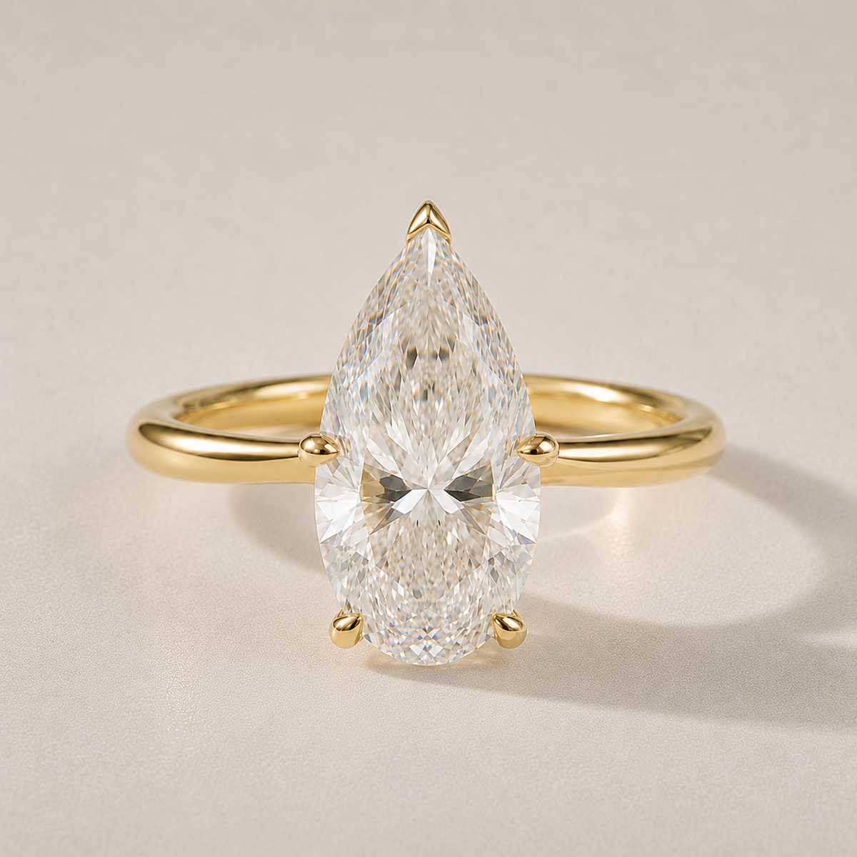 The Rosalind — pear-shaped five-prong lab-grown diamond solitaire in 14K yellow gold