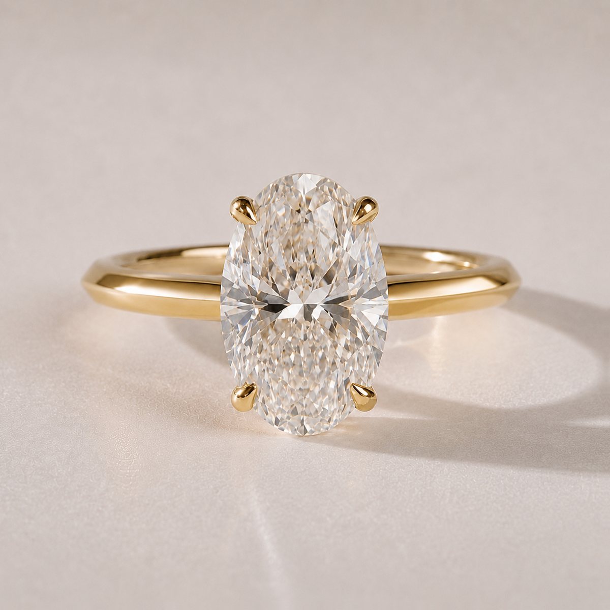 The Solene — oval lab-grown diamond knife-edge engagement ring in 14K yellow gold