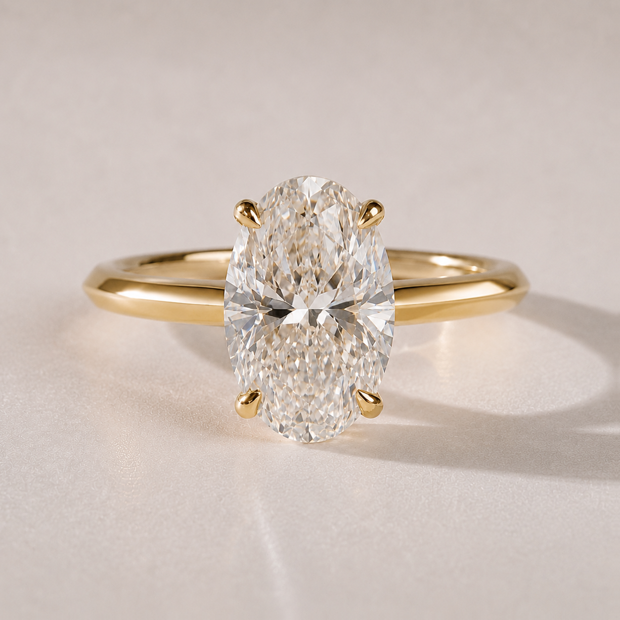 The Solene — oval lab-grown diamond knife-edge engagement ring in 14K yellow gold