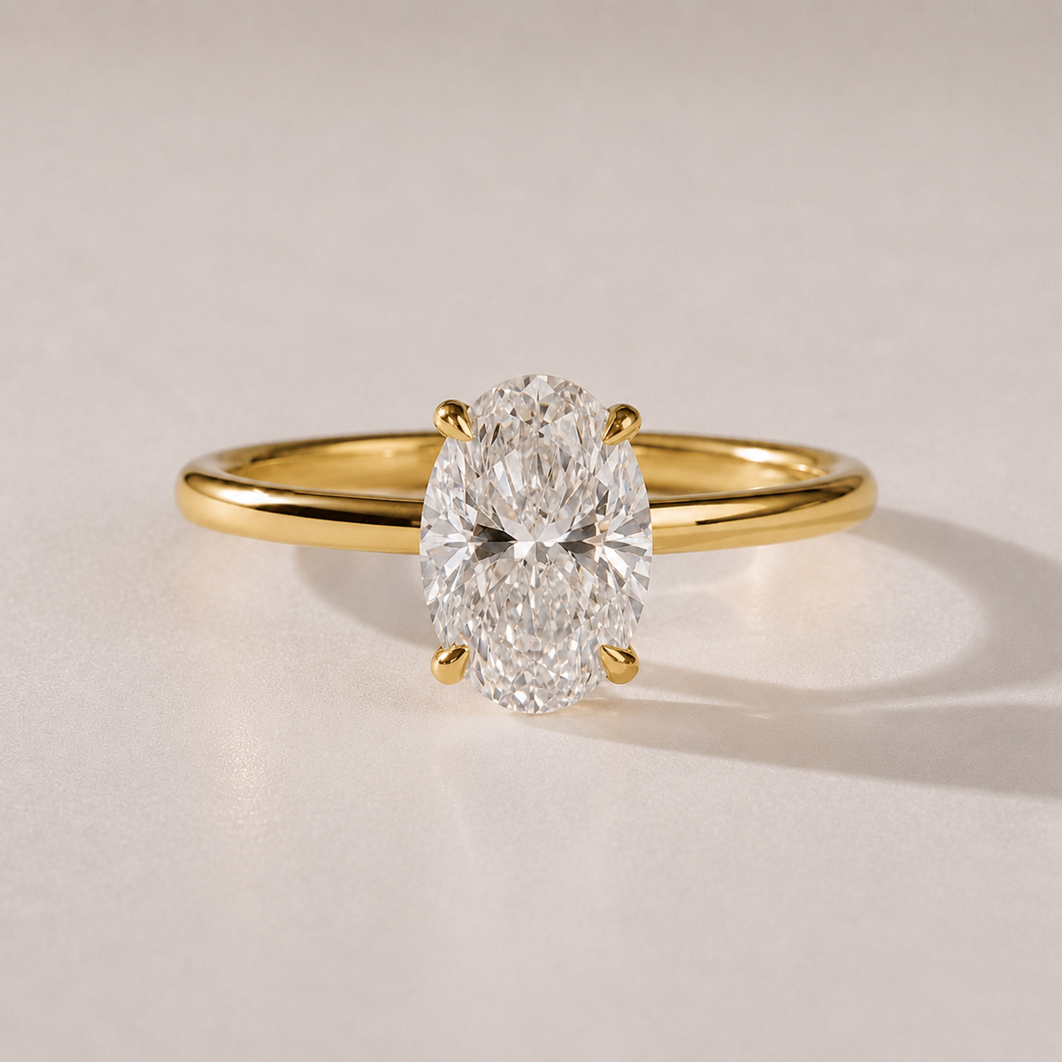 The Sophia — two-carat oval lab-grown diamond solitaire engagement ring in 14K yellow gold