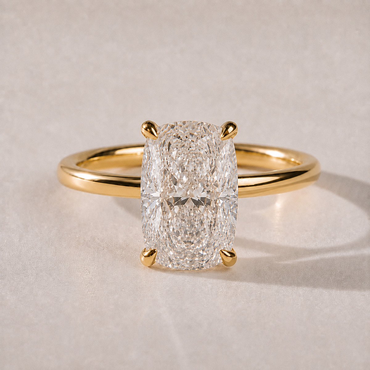 The Vivienne elongated cushion lab-grown diamond hidden halo engagement ring in 14K yellow gold