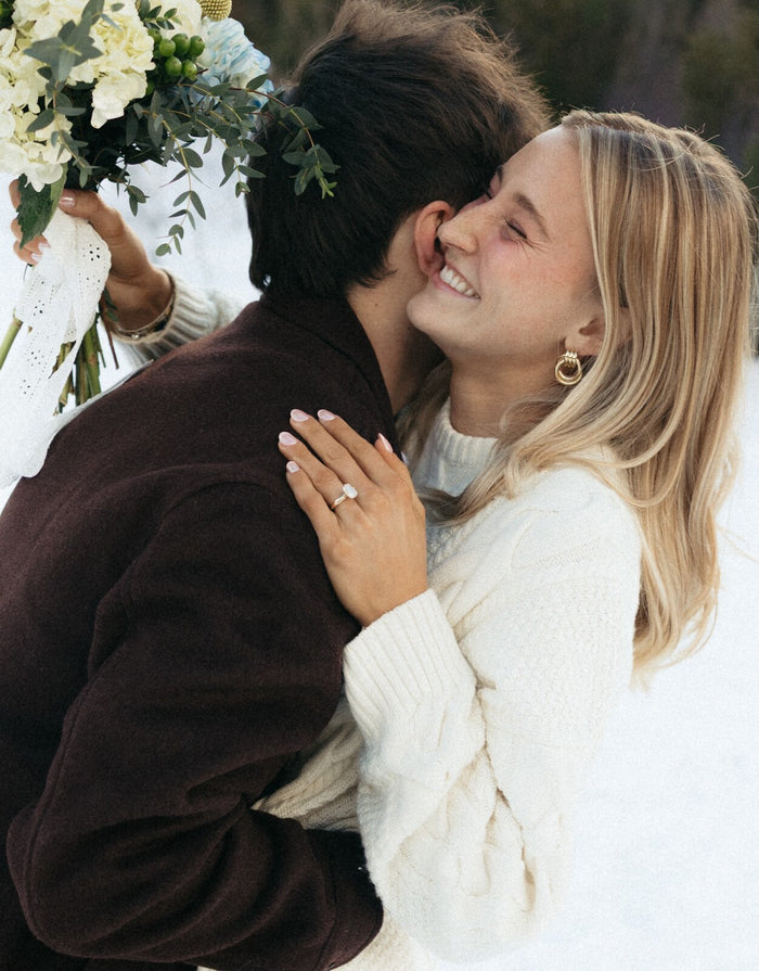 Bride-to-be showing her emerald cut Lavora ring